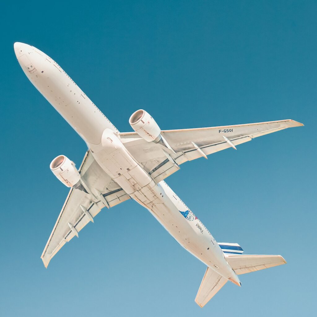 white plane in the sky